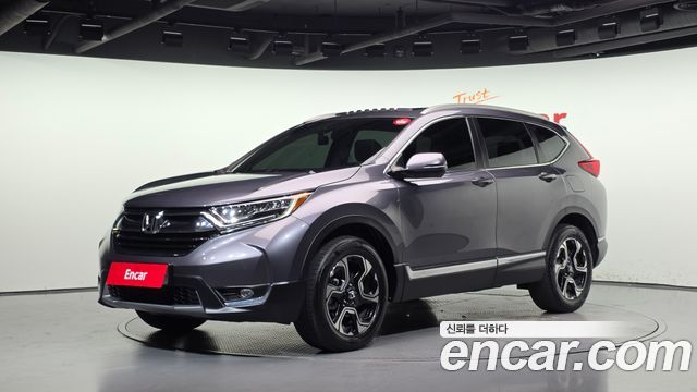 Honda CR-V 1.5 Touring 4WD — пробег 179 852 км — фото 1 из 5