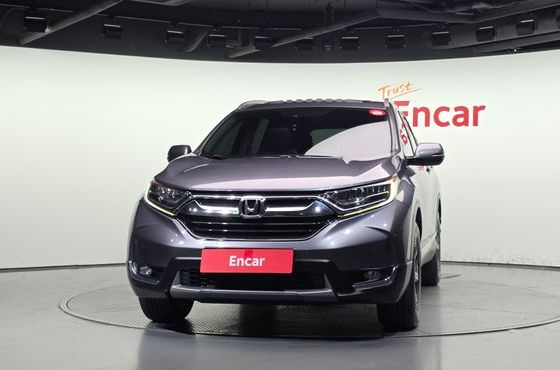 Honda CR-V 1.5 Touring 4WD — пробег 179 852 км — фото 3 из 5