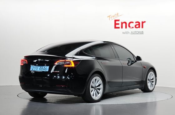 Tesla Model 3 Long Range AWD — пробег 69 621 км — фото 2 из 5
