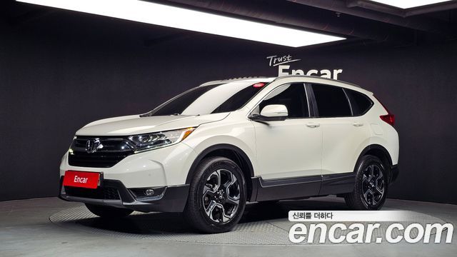 Honda CR-V 1.5 Touring 4WD — пробег 131 927 км — фото 1 из 5