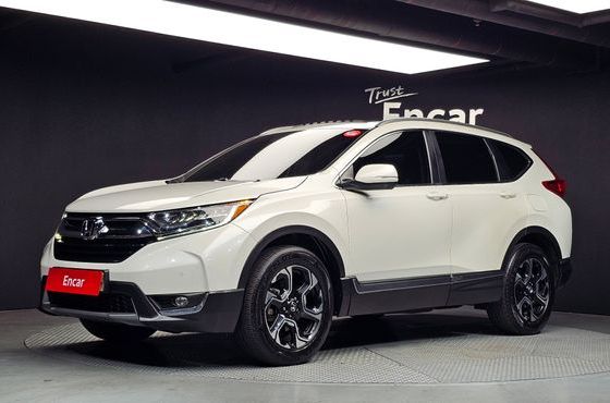 Honda CR-V 1.5 Touring 4WD — пробег 131 927 км — фото 1 из 5