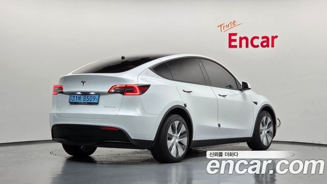 Tesla Model Y Long Range AWD — пробег 126 955 км — фото 2 из 5