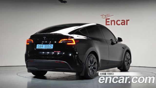 Tesla Model Y RWD — пробег 32 812 км — фото 2 из 5