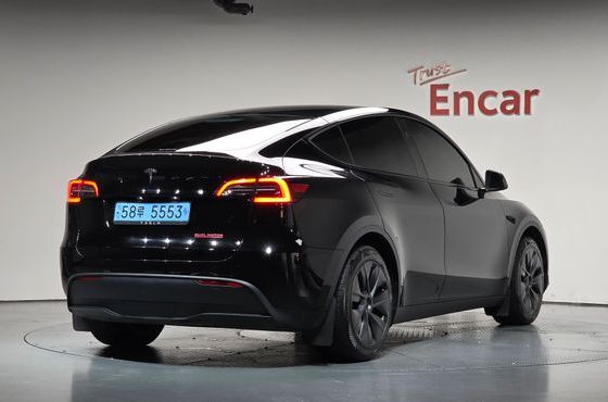 Tesla Model Y RWD — пробег 32 812 км — фото 2 из 5