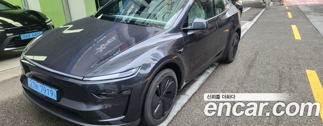 Tesla Model Y Premium RWD — пробег 4 241 км — фото 2 из 5