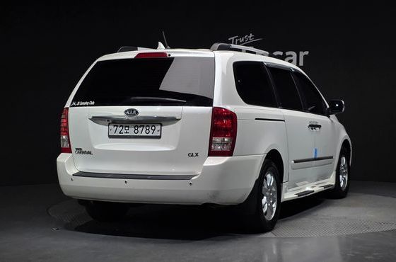 Kia Carnival Grand Carnival GLX Premium — пробег 132 020 км — фото 2 из 5