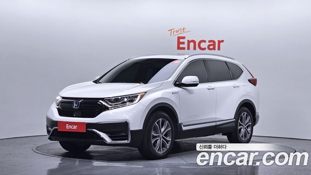 Honda CR-V 2.0 Hybrid Touring 4WD — пробег 42 045 км — фото 1 из 5