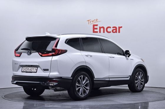 Honda CR-V 2.0 Hybrid Touring 4WD — пробег 42 045 км — фото 2 из 5