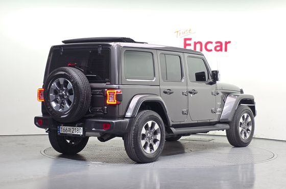Jeep Wrangler 2.0 Overland Power Top 4Door — пробег 130 594 км — фото 2 из 5