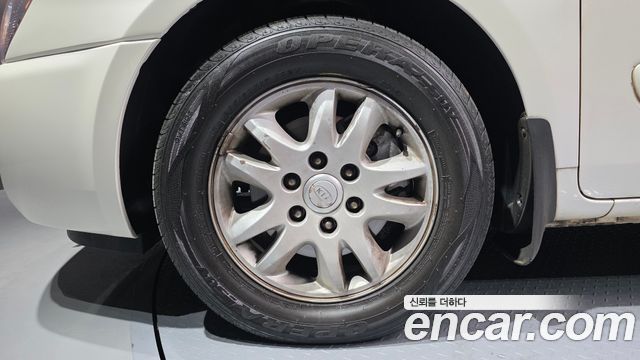 Kia Carnival GLX — пробег 394 058 км — фото 5 из 5