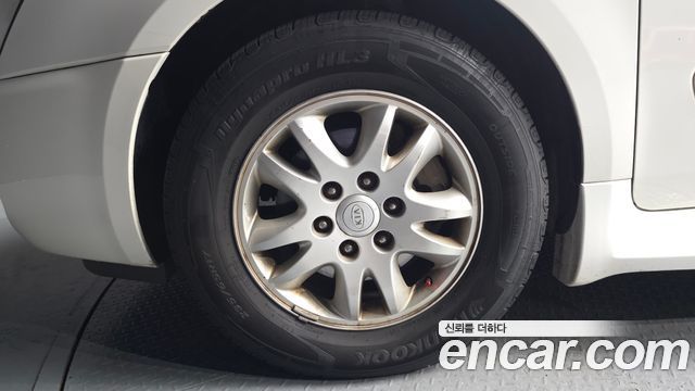 Kia Carnival GLX — пробег 160 807 км — фото 5 из 5