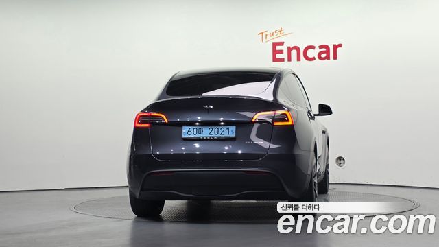 Tesla Model Y Long Range AWD — пробег 21 800 км — фото 4 из 5