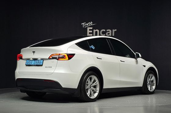 Tesla Model Y RWD — пробег 37 872 км — фото 2 из 5