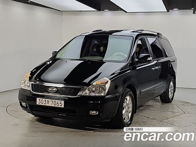 Kia Carnival Grand Carnival GLX Premium — пробег 199 932 км — фото 1 из 5