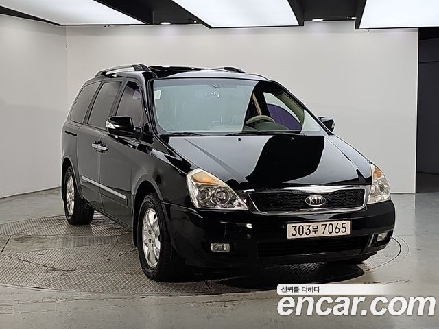 Kia Carnival Grand Carnival GLX Premium — пробег 199 932 км — фото 2 из 5