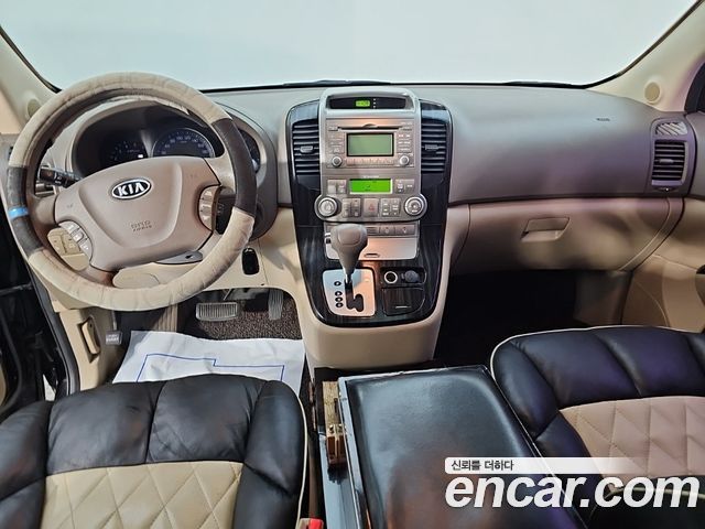 Kia Carnival Grand Carnival GLX Premium — пробег 199 932 км — фото 5 из 5