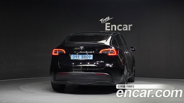 Tesla Model Y RWD — пробег 61 535 км — фото 4 из 5
