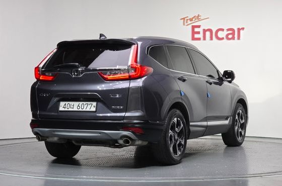 Honda CR-V 1.5 Touring 4WD — пробег 112 477 км — фото 2 из 5