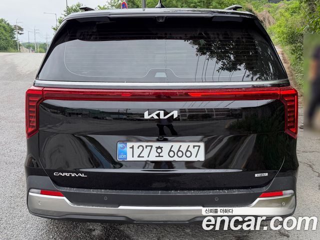 Kia Carnival HEV 9seater Signature — пробег 1 630 км — фото 4 из 5