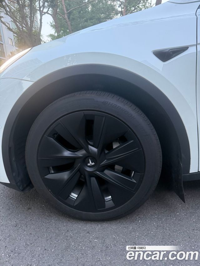 Tesla Model Y Long Range AWD — пробег 76 218 км — фото 5 из 5
