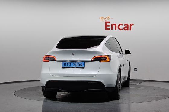 Tesla Model Y RWD — пробег 22 774 км — фото 4 из 5