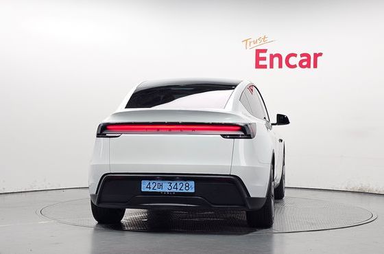 Tesla Model Y RWD — пробег 24 991 км — фото 4 из 5