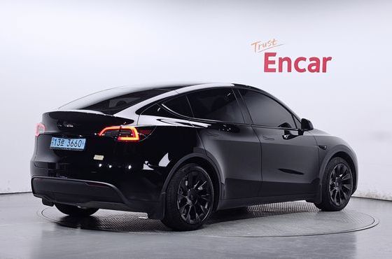 Tesla Model Y RWD — пробег 34 610 км — фото 2 из 5