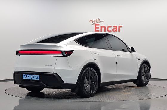 Tesla Model Y Long Range AWD — пробег 14 457 км — фото 2 из 5