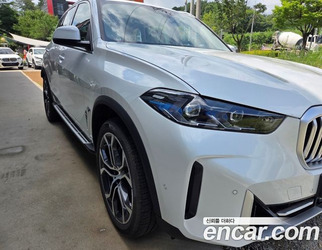 BMW X5 xDrive 50e M Sport — пробег 780 км — фото 4 из 5