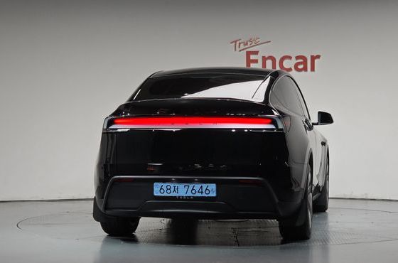 Tesla Model Y RWD — пробег 4 690 км — фото 4 из 5