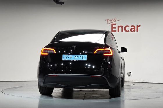 Tesla Model Y RWD — пробег 34 707 км — фото 4 из 5