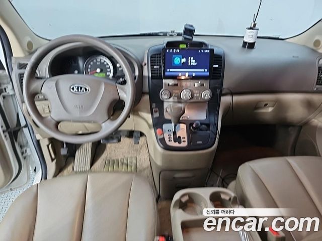Kia Carnival LPI GX Deluxe — пробег 241 100 км — фото 5 из 5
