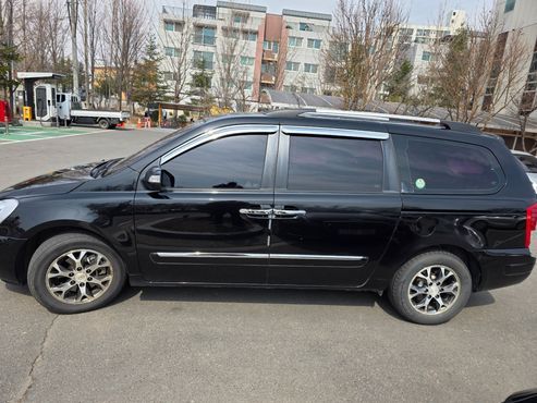 Kia Carnival New Carnival Limousine GLX High-Deluxe — пробег 263 140 км — фото 3 из 5