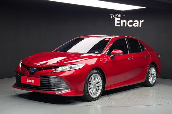 Toyota Camry 2.5 XLE Hybrid — пробег 125 501 км — фото 1 из 5