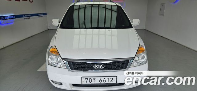 Kia Carnival Grand Carnival GLX Premium — пробег 319 950 км — фото 1 из 5