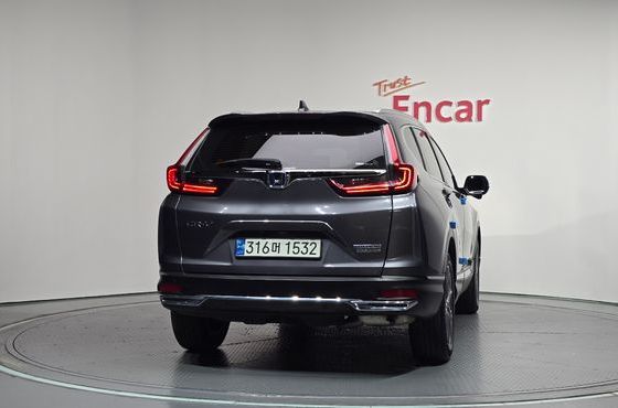 Honda CR-V 2.0 Hybrid Touring 4WD — пробег 37 595 км — фото 4 из 5