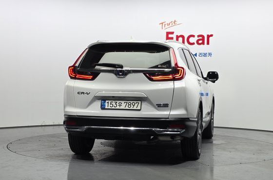 Honda CR-V 2.0 Hybrid Touring 4WD — пробег 67 368 км — фото 4 из 5
