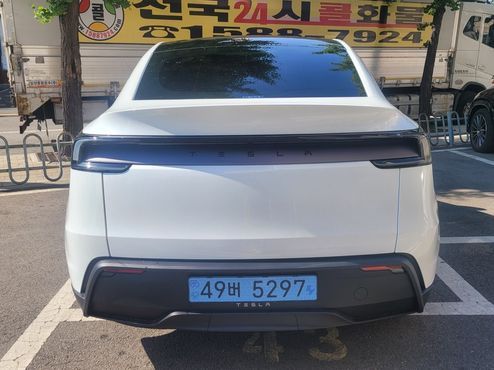 Tesla Model Y Premium RWD — пробег 2 100 км — фото 5 из 5
