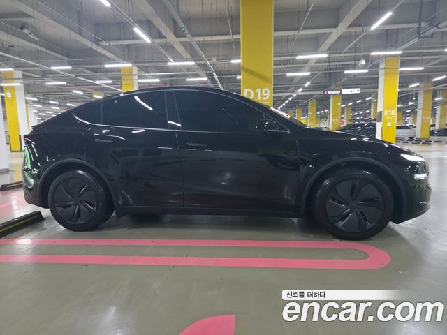 Tesla Model Y Premium Long Range AWD — пробег 1 500 км — фото 3 из 5