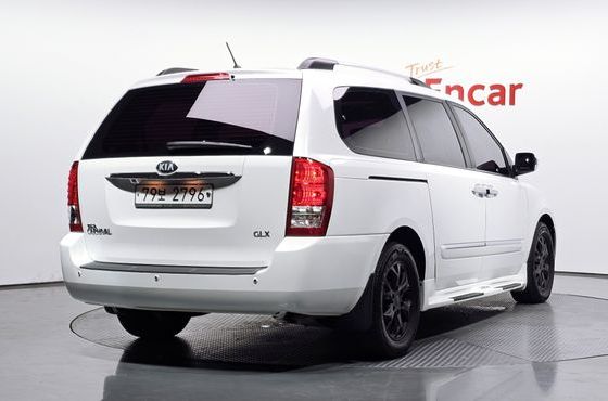 Kia Carnival Grand Carnival GLX Premium — пробег 139 076 км — фото 2 из 5