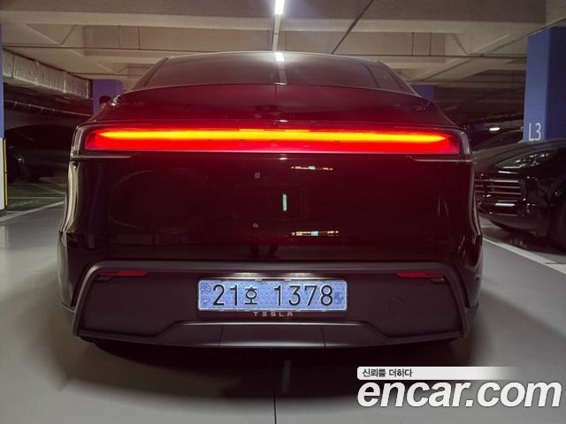Tesla Model Y Premium RWD — пробег 1 127 км — фото 2 из 5