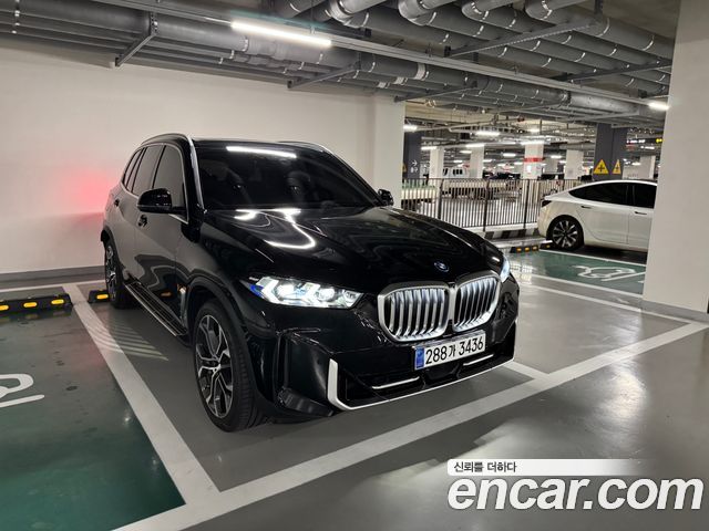 BMW X5 xDrive 50e xLine — пробег 32 210 км — фото 1 из 5