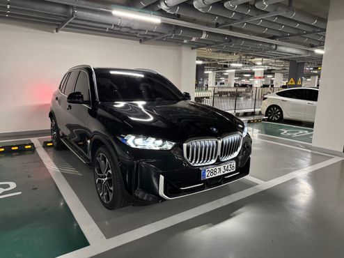 BMW X5 xDrive 50e xLine — пробег 32 210 км — фото 1 из 5