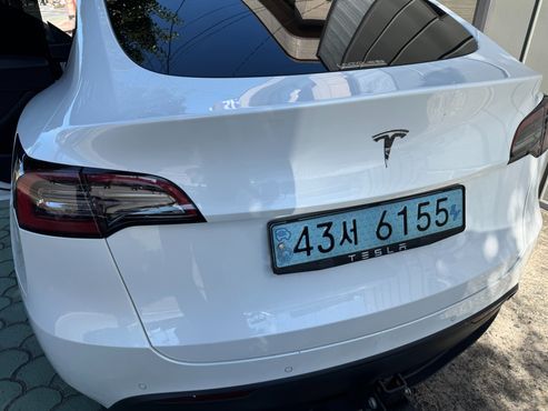 Tesla Model Y Standard Range RWD — пробег 103 200 км — фото 2 из 5