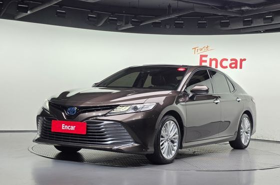 Toyota Camry 2.5 XLE Hybrid — пробег 144 204 км — фото 1 из 5