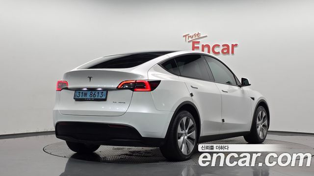 Tesla Model Y Long Range AWD — пробег 65 815 км — фото 2 из 5