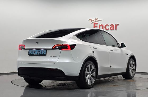Tesla Model Y Long Range AWD — пробег 65 815 км — фото 2 из 5