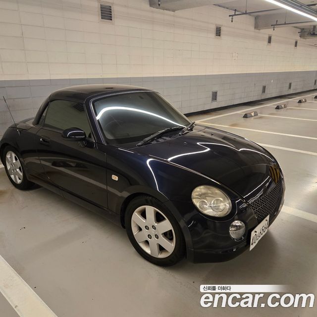 Daihatsu Copen 0.6 — пробег 89 000 км — фото 1 из 5
