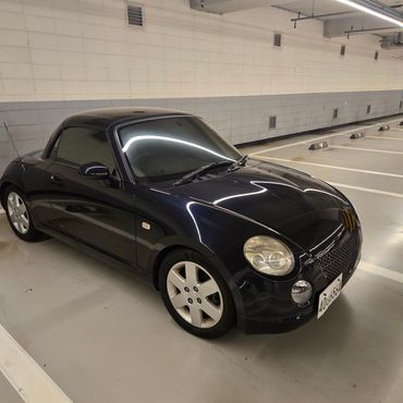 Daihatsu Copen 0.6 — пробег 89 000 км — фото 1 из 5