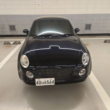 Daihatsu Copen 0.6 — пробег 89 000 км — фото 3 из 5